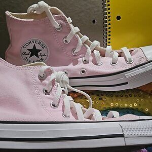 Light pink high top chuck taylors